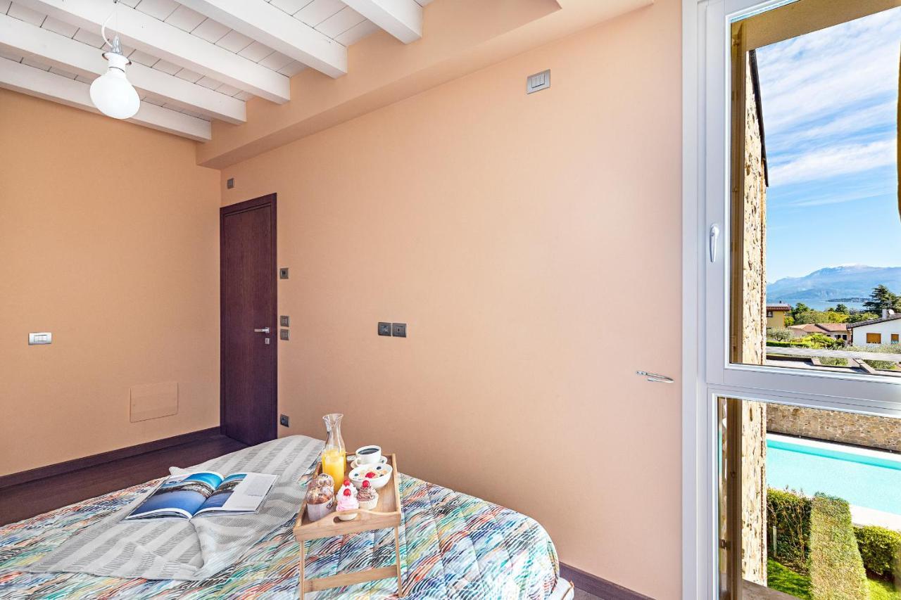 Warda C11 Apartment By Wonderful Italy เดเซนซาโนเดลการ์ดา ภายนอก รูปภาพ